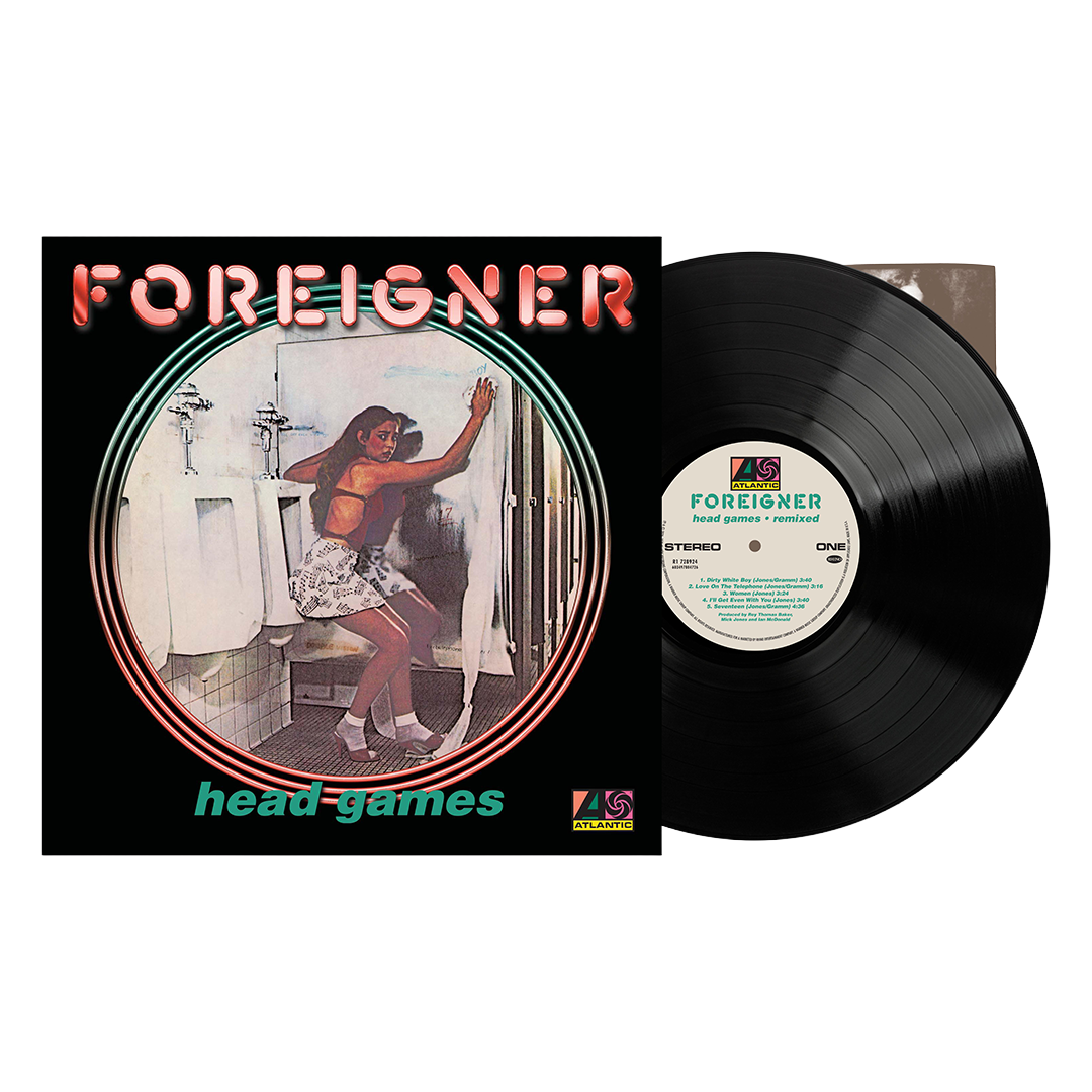 Vinyl record album 'head games' by Foreigner, showing the black LP partially pulled from the black sleeve, which features a vintage-style illustration of a woman in a bathroom.