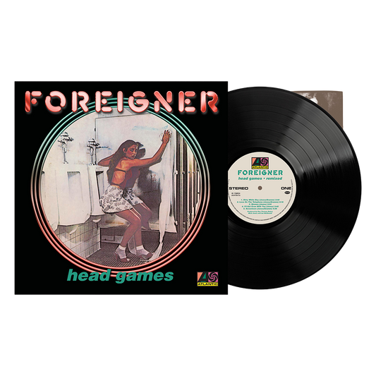 Vinyl record album 'head games' by Foreigner, showing the black LP partially pulled from the black sleeve, which features a vintage-style illustration of a woman in a bathroom.