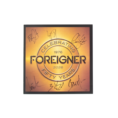 Front of Foreigner's 50th Anniversary Tour Book that reads'Celebrating 50 Years' and is signed by the all the members on a gold-to-orange gradient center 