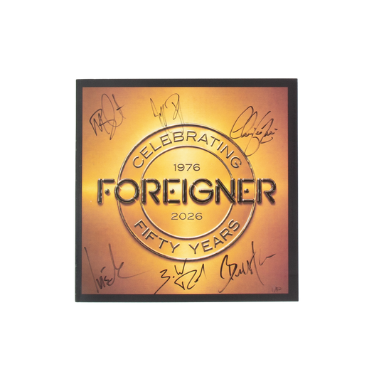 Front of Foreigner's 50th Anniversary Tour Book that reads'Celebrating 50 Years' and is signed by the all the members on a gold-to-orange gradient center