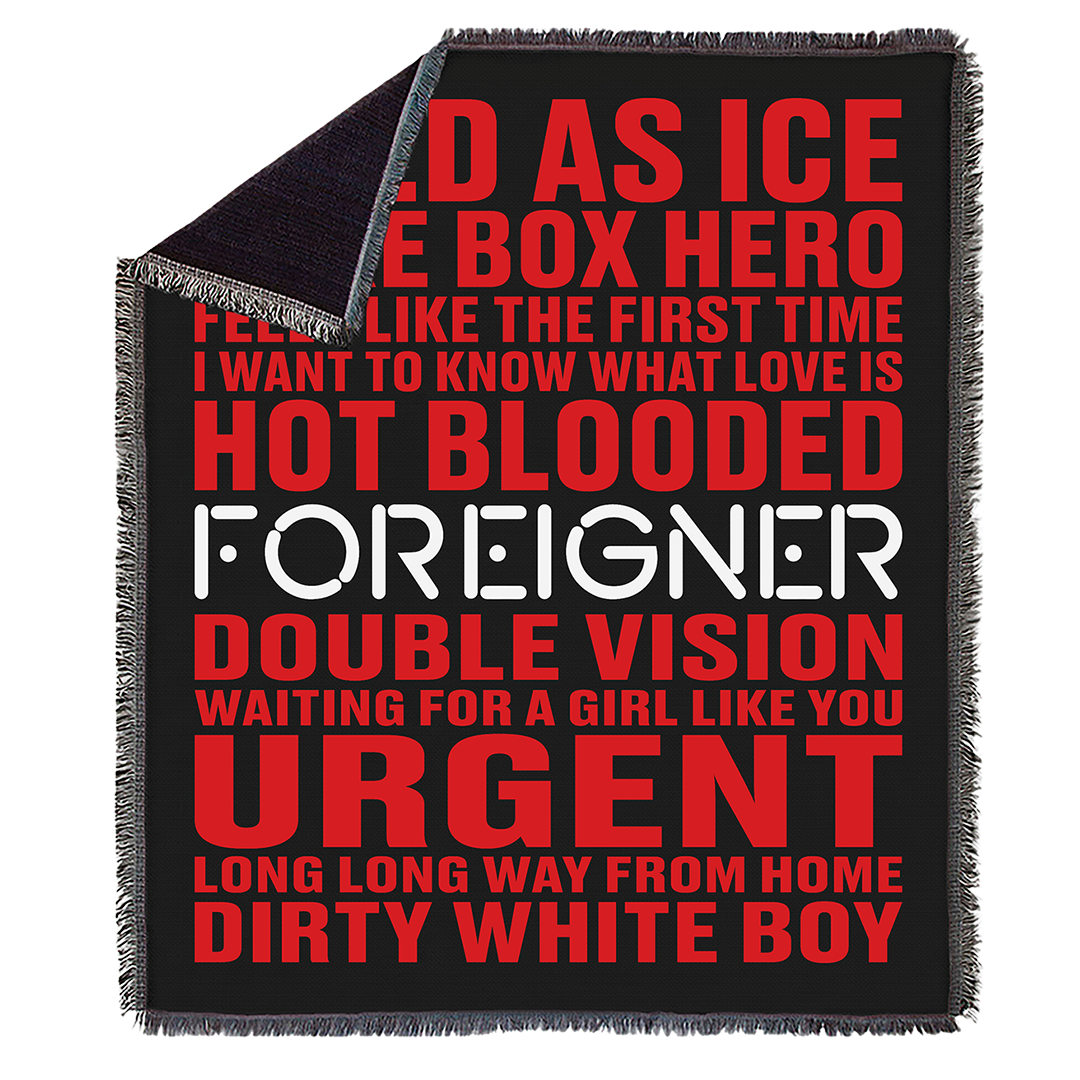 Black blanket with red and white text on a white background